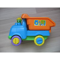 Машинка самосвал  грузовик с водителем. Детская игрушка. Материал игрушки пластик. Размер 26х17х11 см.Как НОВАЯ.