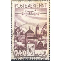 Марокко. Протекторат Франции. 1947 год. авиапочта. Самолет над городом. Mi:MA 270. Гашеная.