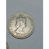 Карибы 25 центов 1965 года .