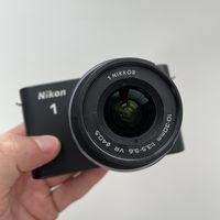 Фотоаппарат Nikon  1 J1 с объективом 10-30 мм
