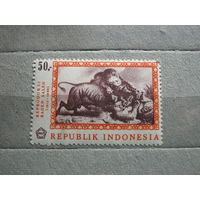 Марка - Индонезия 1967 фауна охота львы дикие кошки