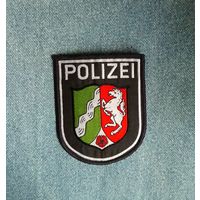 Шеврон полиции Германии.